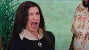 meme da moça piscando exageradamente