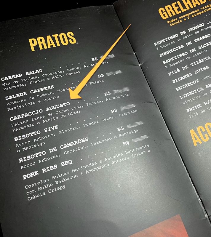 Foto de cardápio, com um prato denominado “Carpaccio Augusto“
