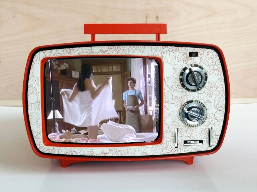 Cena em que Anita se revela para o verdureiro Zezinho