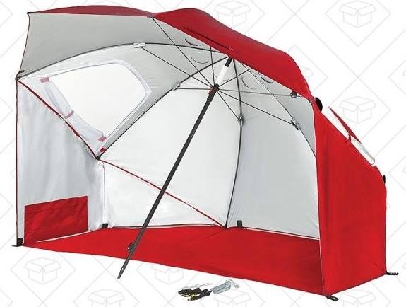 um misto entre guarda-sol e barraca, em cor vermelha e branca