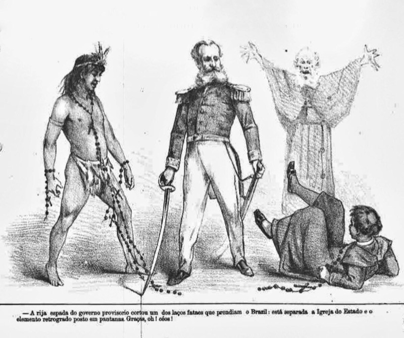 Charge da “Revista Ilustrada” comemorando a separação da Igreja e o Estado no Governo de Deodoro da Fonseca em 1890, mostra o militar cortando uma corrente que prendia um altivo índio a um padre caído no chão, e diz: “A rija espada do governo provisorio cortou um dos laços fataes que prendiam o Brazil: está separada a Igreja do Estado e o elemento retrógrado posto em pantanas. Graças, oh! céos!“
