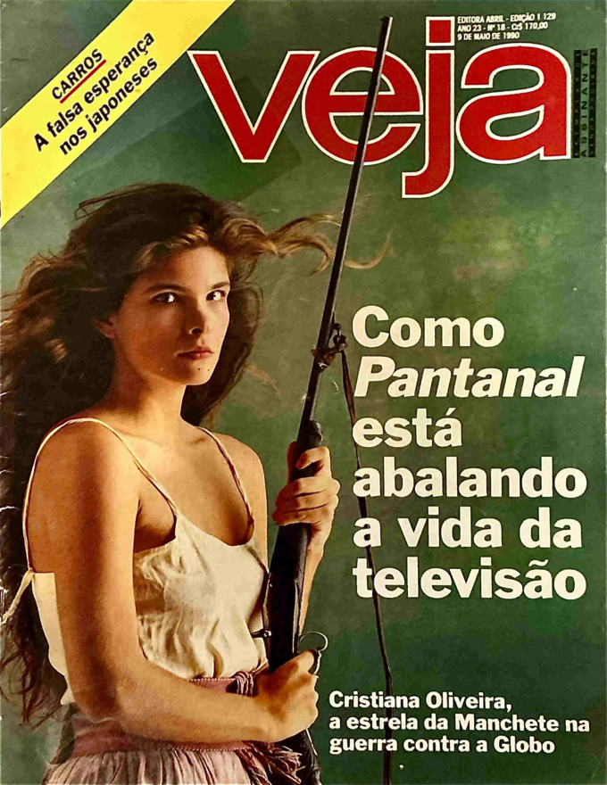 Capa da revista Veja com Juma Marruá segurando uma espingarda, e o título: Como Pantanal está abalando a vida da televisão
