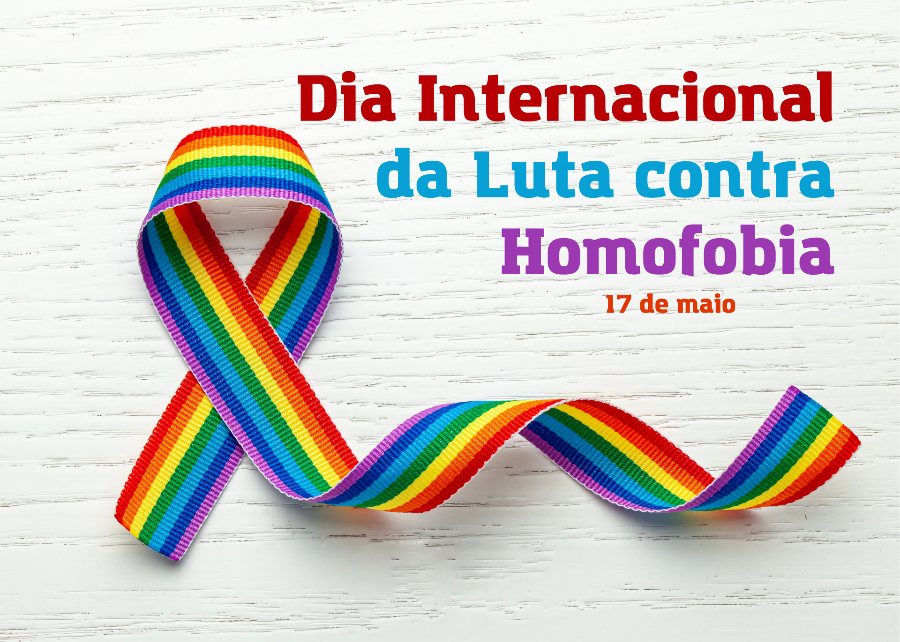 Banner alusivo à data, ilustrado por uma fita com as cores do arco-íris