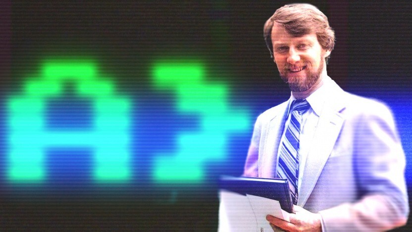 Gary Kildall com um prompt do CP/M ao fundo