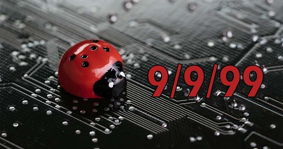 Uma joaninha sobre uma placa de computador. ao lado da data 9/9/99 em números vermelhos