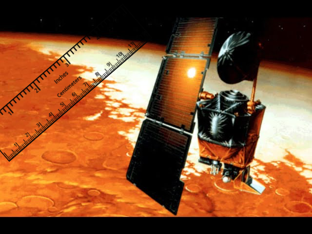 Escala de conversão entre centímetros e polegadas, sobreposta a uma imagem artística da sonda extraviada