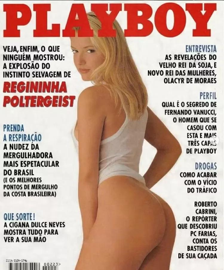 Capa da revista Playboy de abril de 1994, mostrando uma mulher loira, de costas e usando apenas um top branco, e a chamada: <br><br>VEJA, ENFIM, O QUE NINGUÉM MOSTROU:<br>A EXPLOSÃO DO INSTINTO SELVAGEM DE REGININHA POLTERGEIST