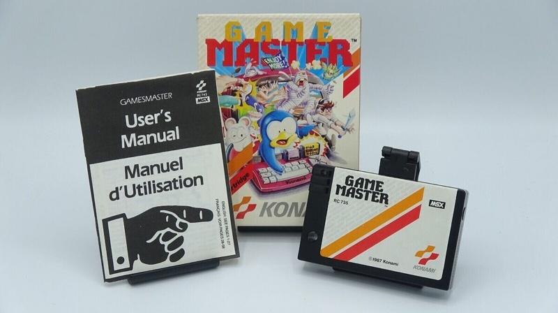 Foto mostrando a caixa, o cartucho e o manual de uma edição em francês do Konami Game Master.